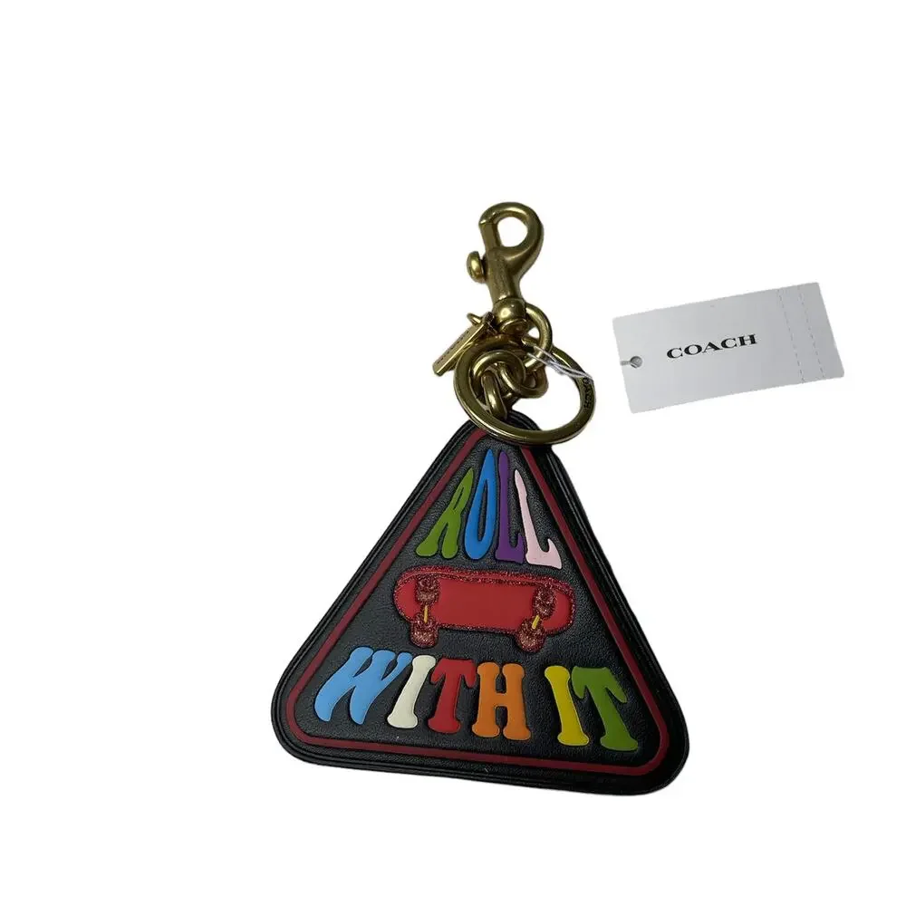 Coach Pride Roll With It Bag Charm in Rainbow Signature Canvas & Leather